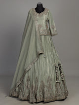 Sage green tissue silk lehenga choli with rajasthani style choli