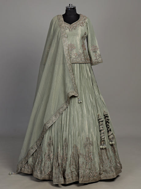 Sage green tissue silk lehenga choli with rajasthani style choli