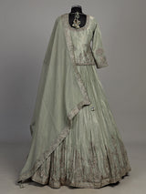 Sage green tissue silk lehenga choli with rajasthani style choli