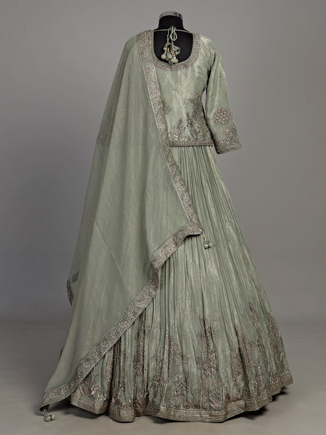 Sage green tissue silk lehenga choli with rajasthani style choli