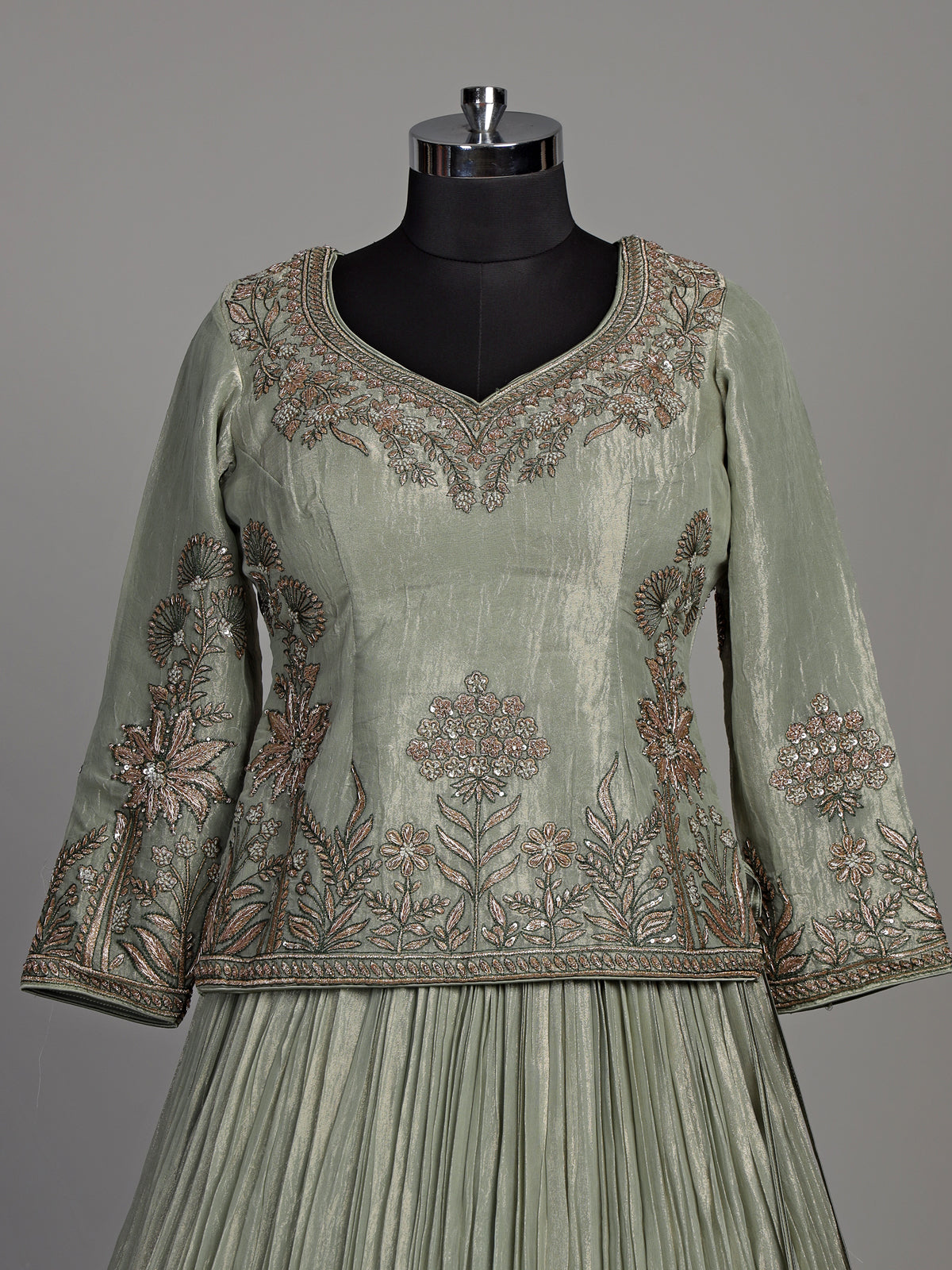Sage green tissue silk lehenga choli with rajasthani style choli