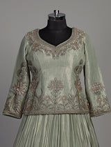 Sage green tissue silk lehenga choli with rajasthani style choli