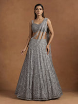 Grey net lehenga choli with pearl embellishments and designer detailing