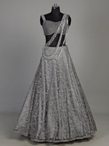 Grey net lehenga choli with pearl embellishments and designer detailing