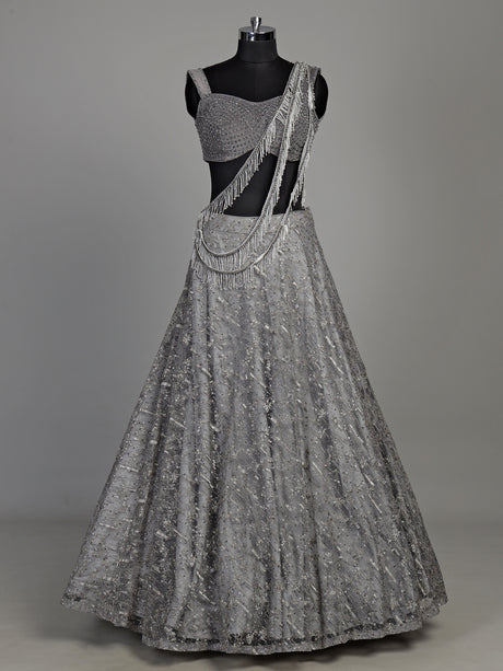 Grey net lehenga choli with pearl embellishments and designer detailing