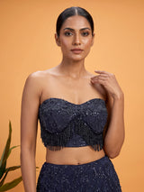 Blue net lehenga choli with designer shrug and zardosi embellishments