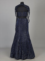 Blue net lehenga choli with designer shrug and zardosi embellishments
