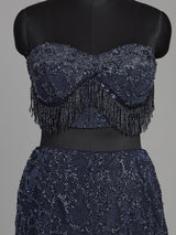 Blue net lehenga choli with designer shrug and zardosi embellishments