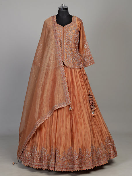 Pastel peach tissue silk lehenga choli with embellished sweetheart neckline