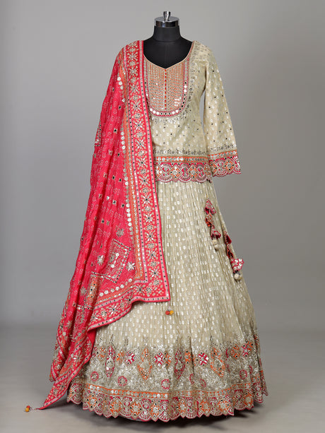 Cream silk lehenga choli with resham aabla and zari yoke