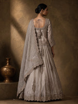Pastel grey tissue silk lehenga choli with cutdana and stone work