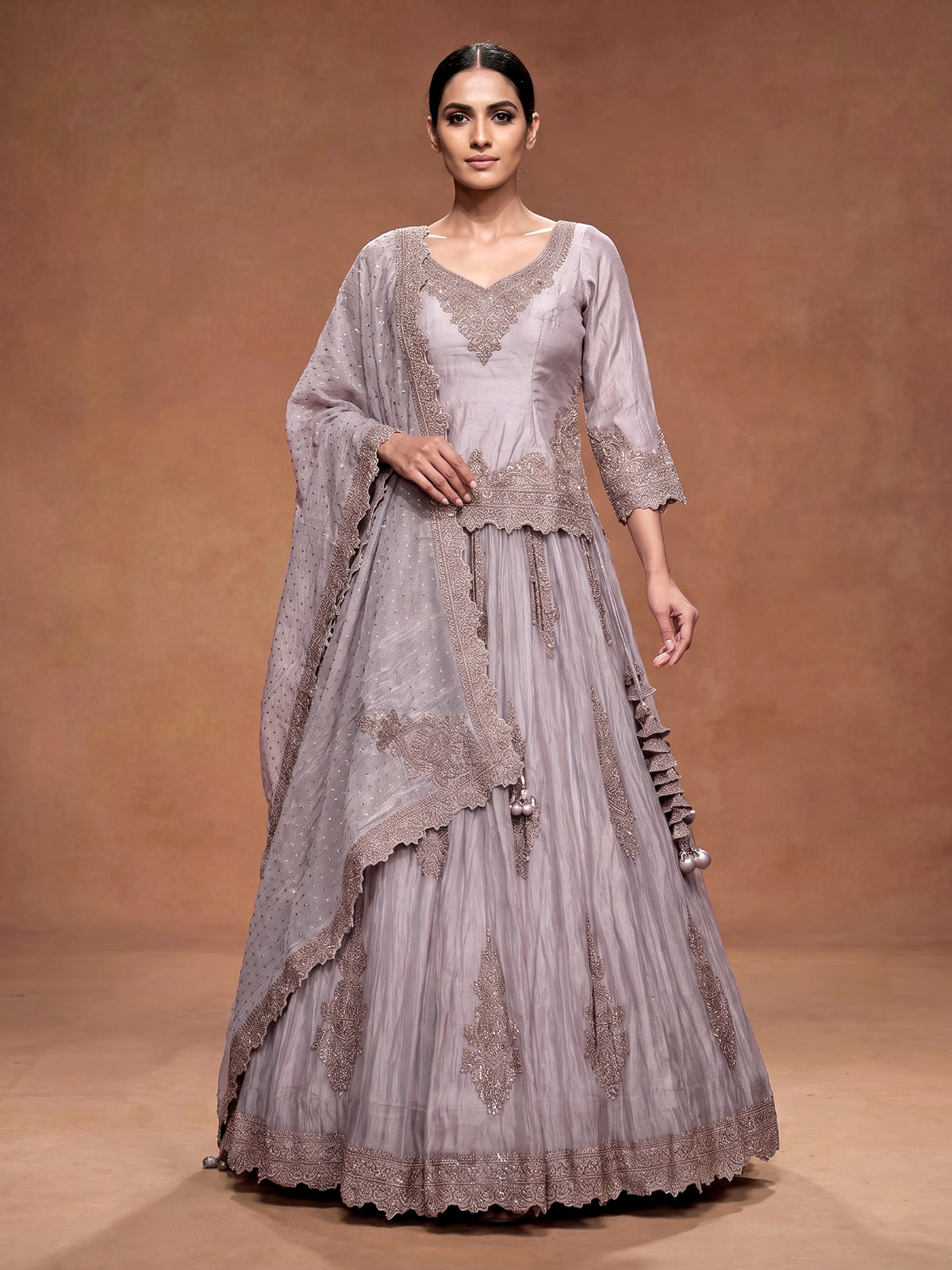 Lilac purple tissue silk lehenga choli with ornate zardosi work