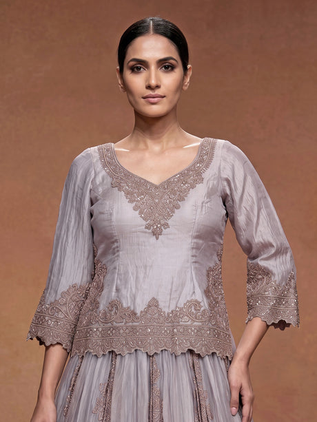 Lilac purple tissue silk lehenga choli with ornate zardosi work