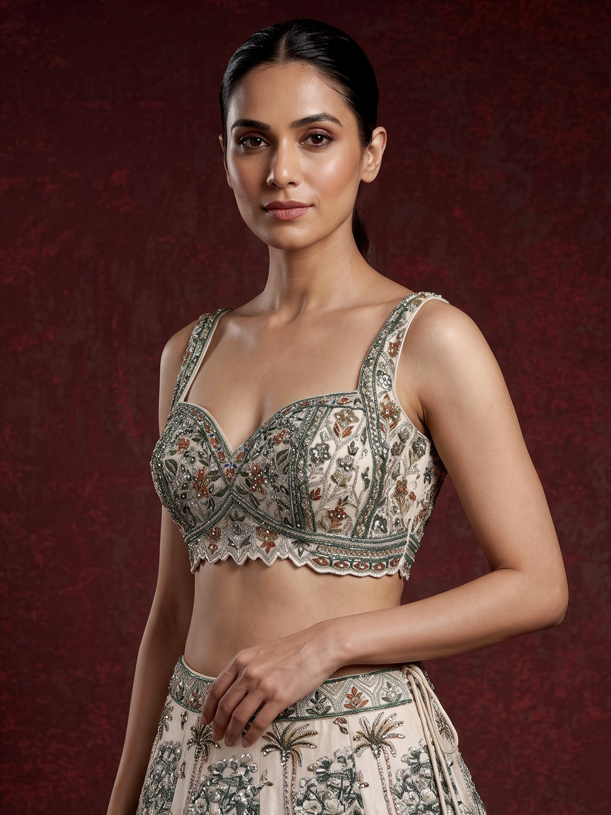 Cream silk printed lehenga choli with intricate zardosi and gota work