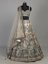 Cream silk printed lehenga choli with intricate zardosi and gota work