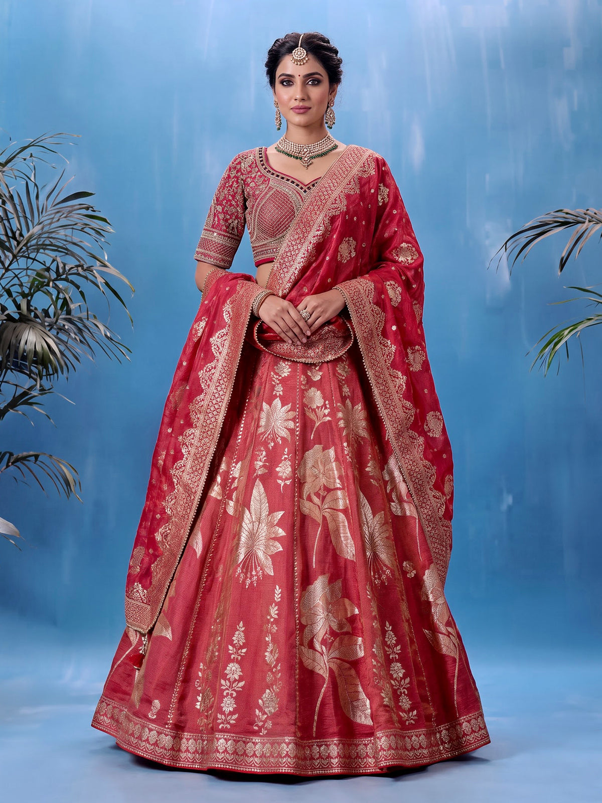 Rani pink silk lehenga choli with ornate floral embroidery