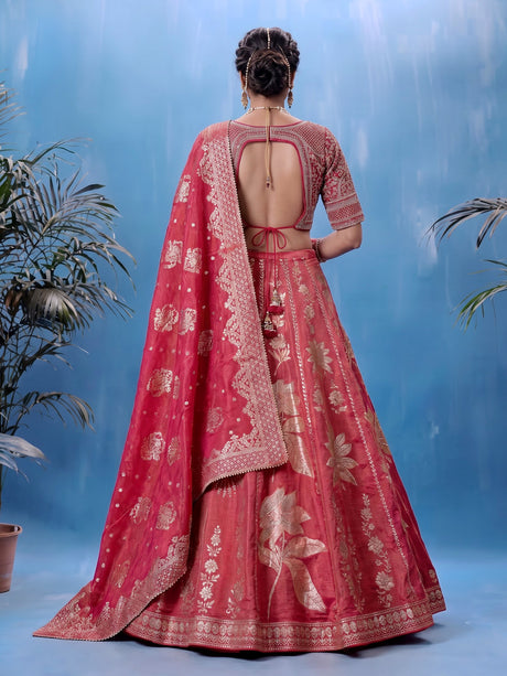 Rani pink silk lehenga choli with ornate floral embroidery