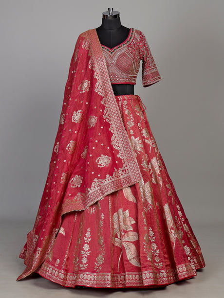 Rani pink silk lehenga choli with ornate floral embroidery