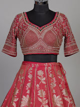 Rani pink silk lehenga choli with ornate floral embroidery