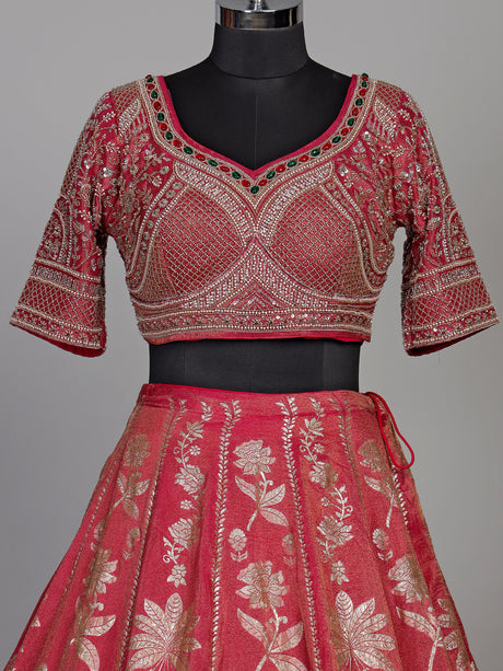 Rani pink silk lehenga choli with ornate floral embroidery