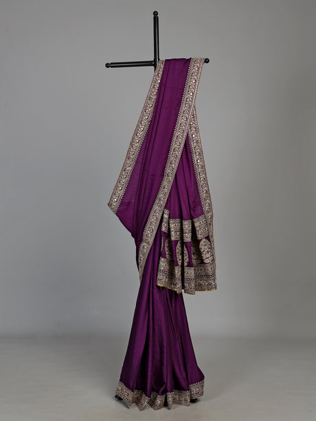 Purple silk saree with embellished border and sequin work