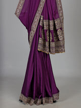 Purple silk saree with embellished border and sequin work
