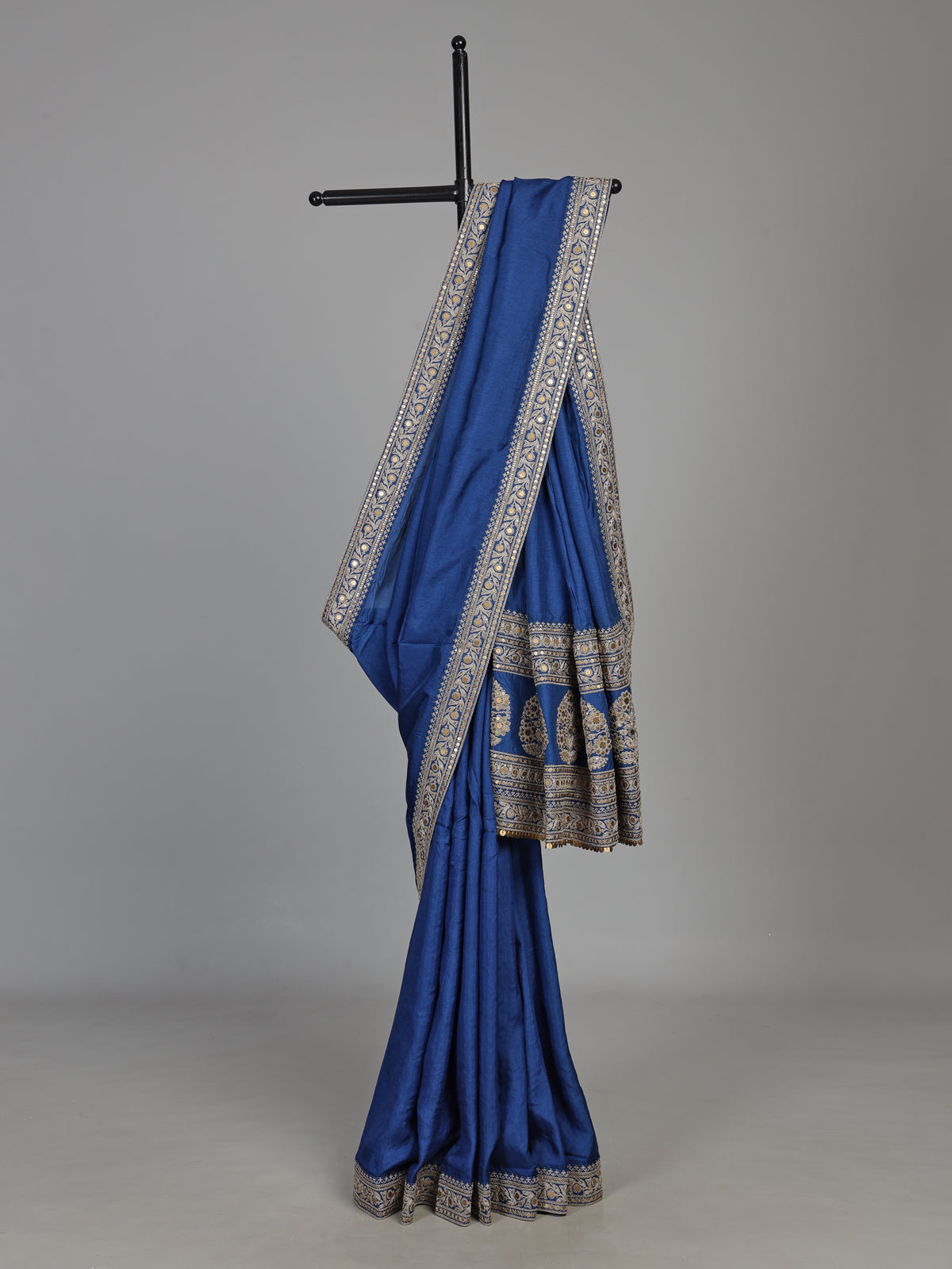 Royal blue silk saree with intricate embroidery and sequin detailing