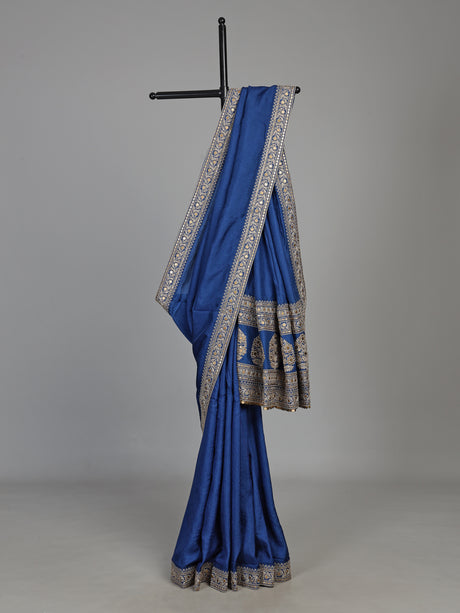 Royal blue silk saree with intricate embroidery and sequin detailing
