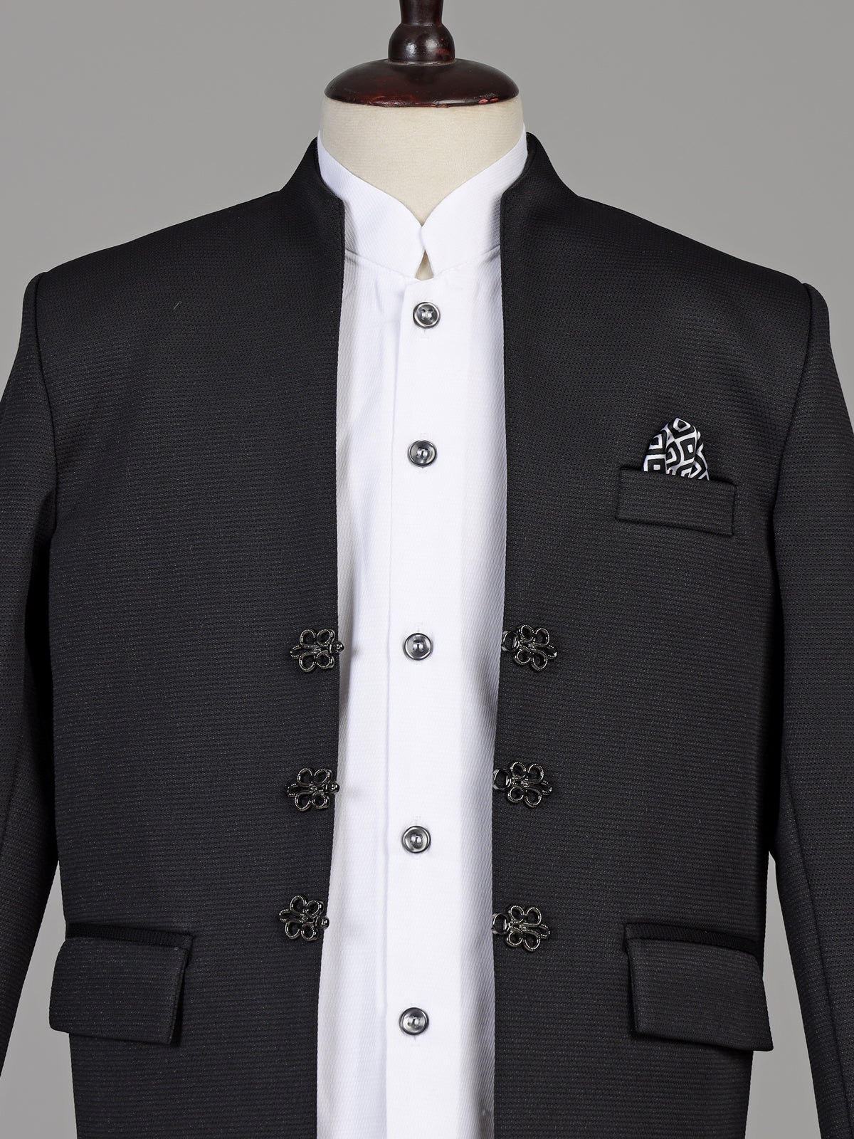 Black textured cotton blend boys coat suit with floral metal fasteners