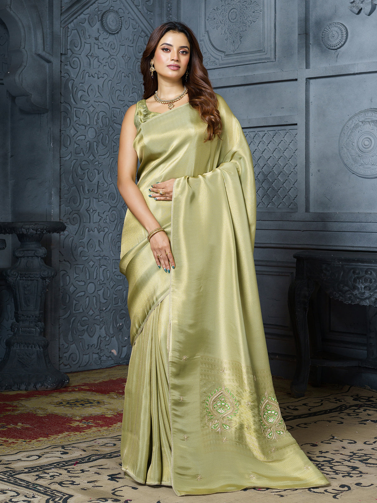 Pastel olive green embellished tissue silk saree for women