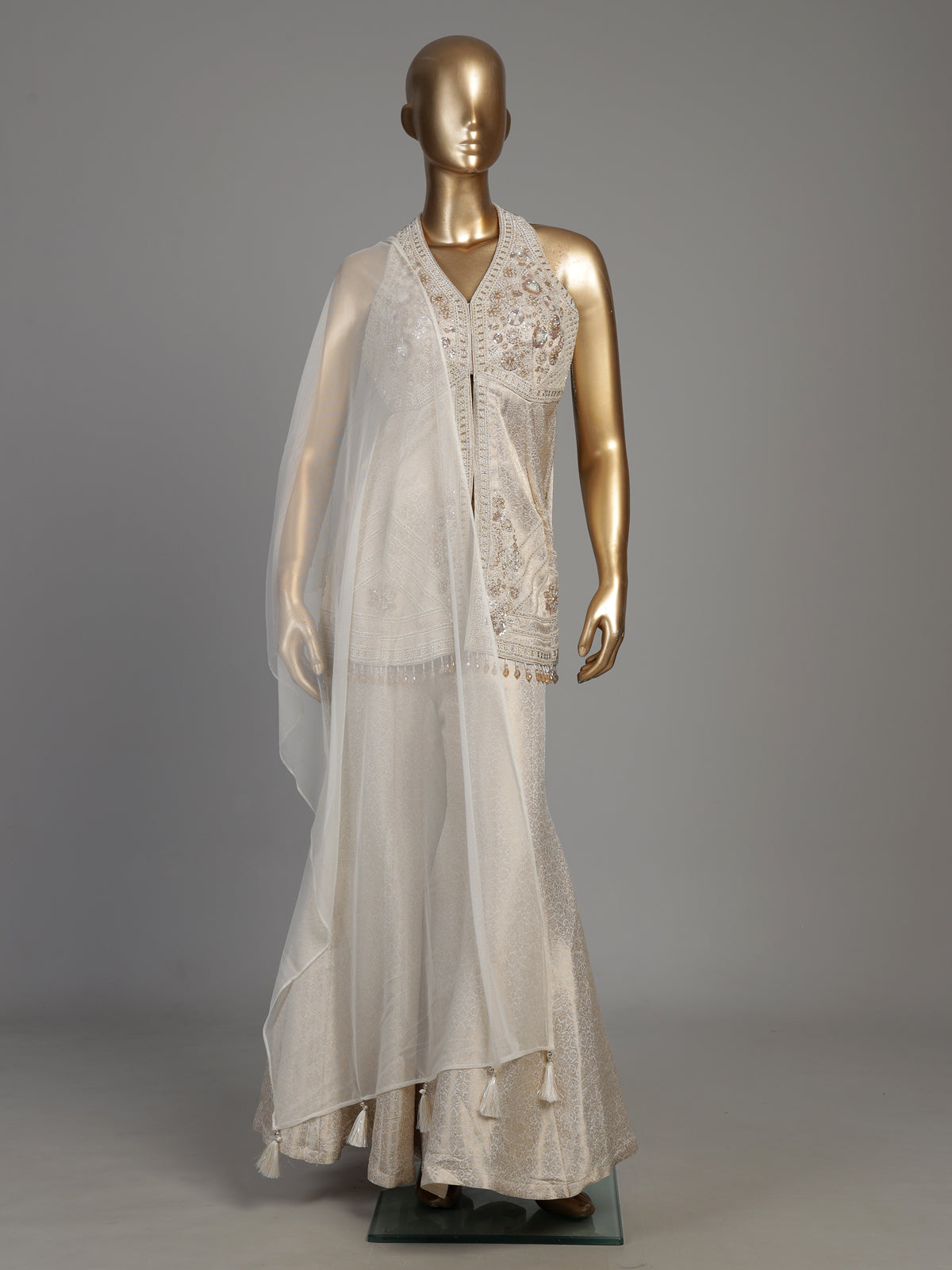 Cream brocade silk palazzo suit with rich cutdana detailing