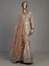 Pastel peach Pakistani silk palazzo suit with mirror embellishments