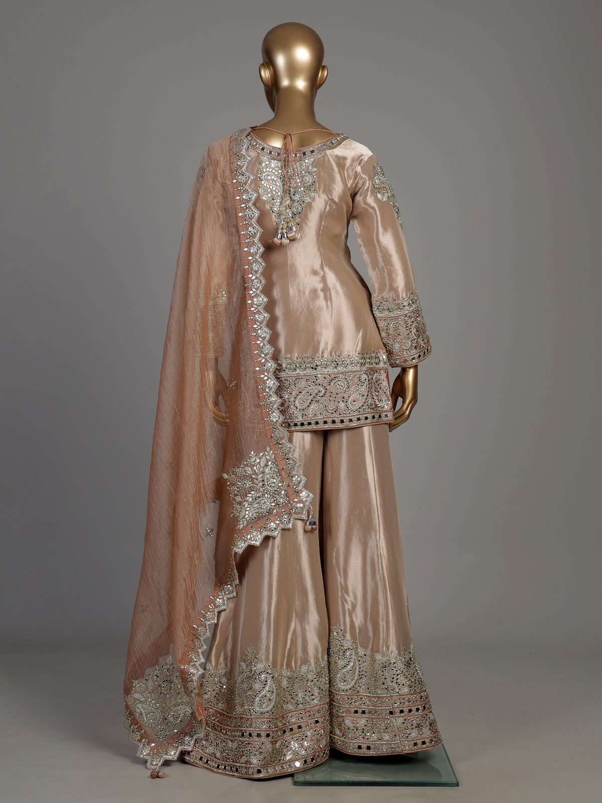 Pastel peach Pakistani silk palazzo suit with mirror embellishments
