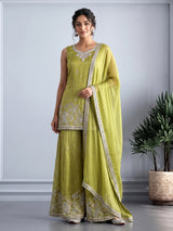 Pastel mehendi green silk palazzo suit with pearl embellishments
