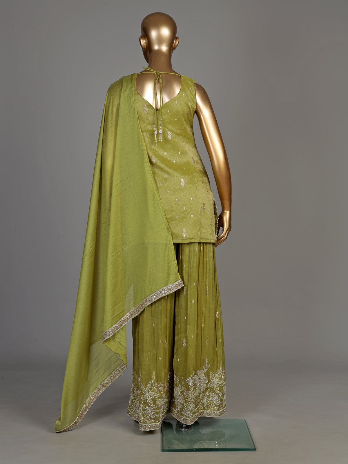 Pastel mehendi green silk palazzo suit with pearl embellishments