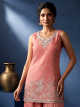 Pastel peach silk palazzo suit with pearl and zari detailing