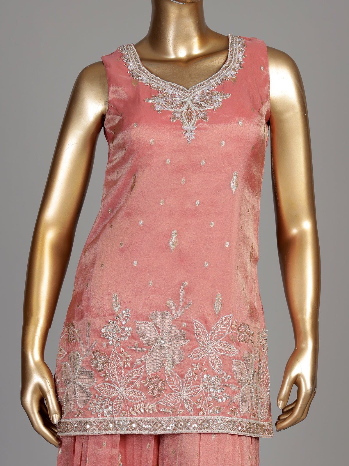 Pastel peach silk palazzo suit with pearl and zari detailing