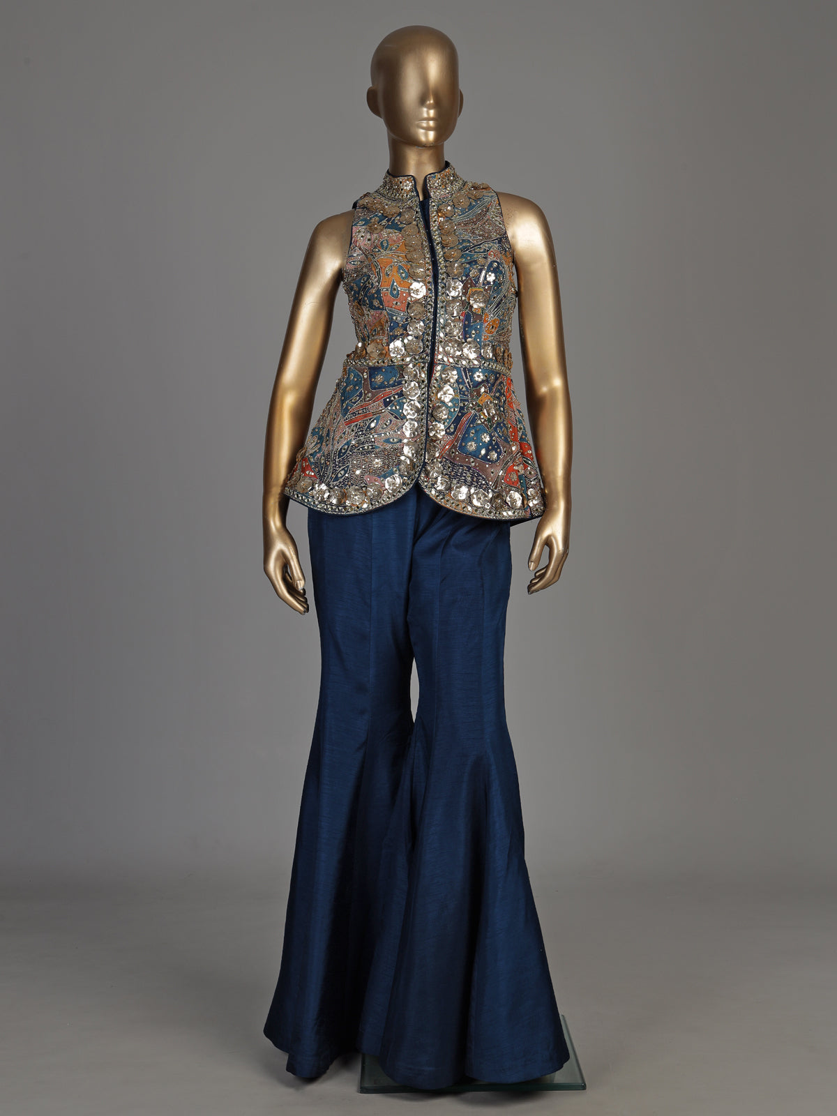 Blue silk palazzo suit with embellished stand collar detailing