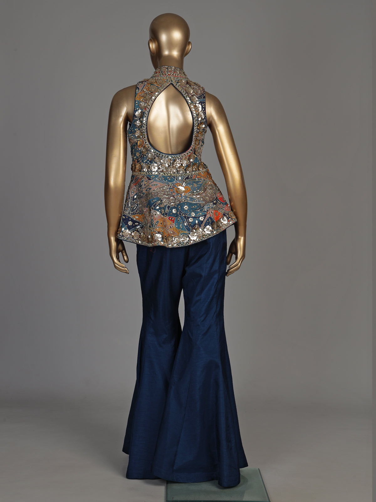 Blue silk palazzo suit with embellished stand collar detailing