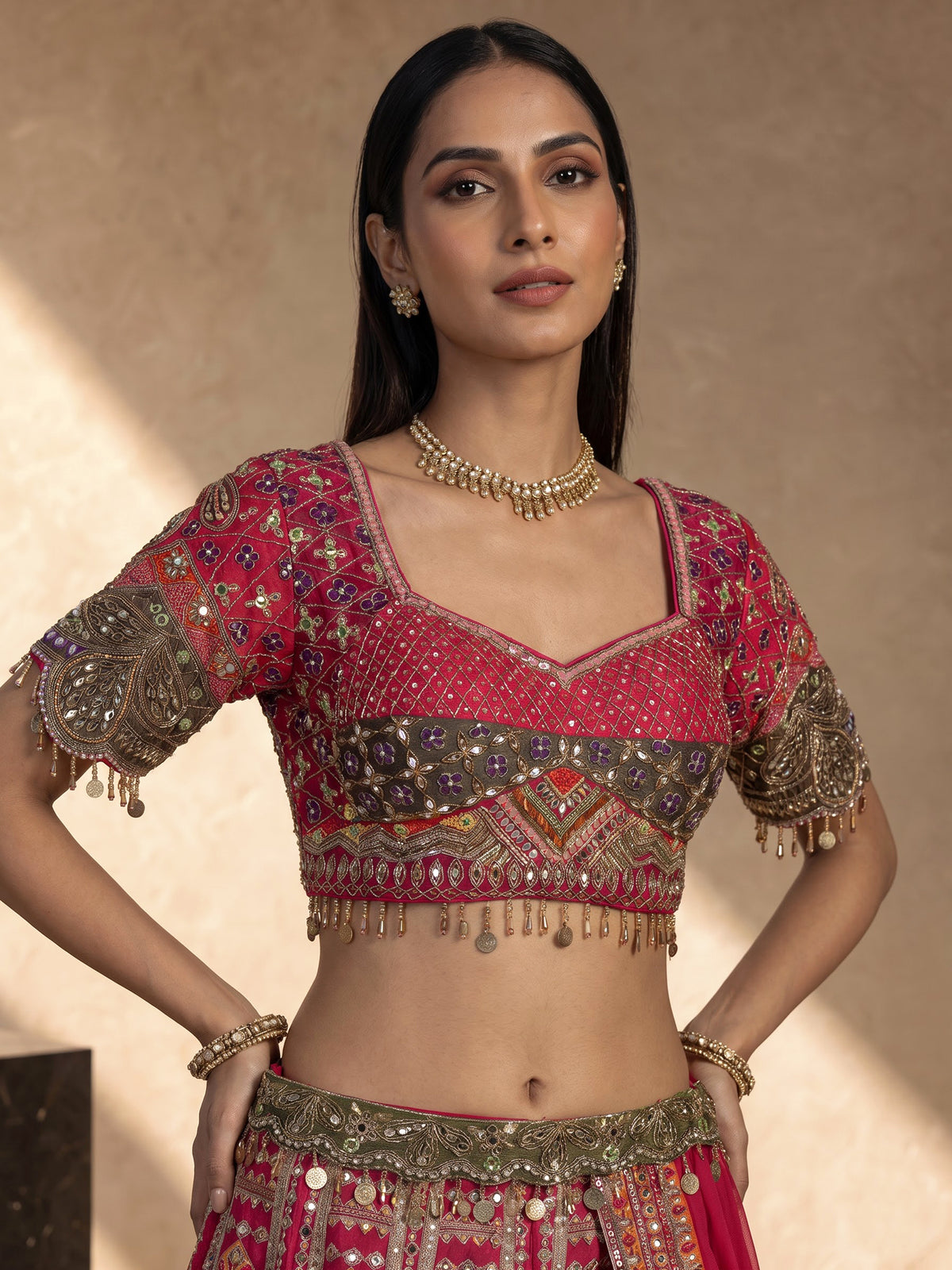 Rani pink silk palazzo suit with an embellished georgette dupatta
