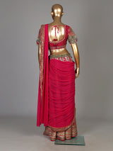 Rani pink silk palazzo suit with an embellished georgette dupatta