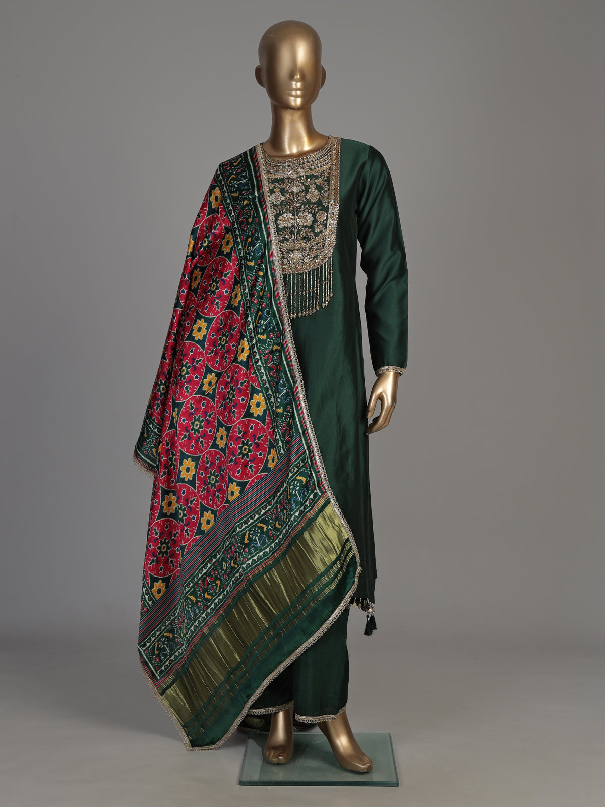 Bottle green silk anarkali suit with patola printed dupatta