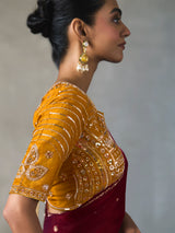 Maroon ornate finish silk blend women saree