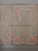 Coffee brown tissue silk saree with floral embroidery and tassels