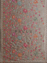 Coffee brown tissue silk saree with floral embroidery and tassels
