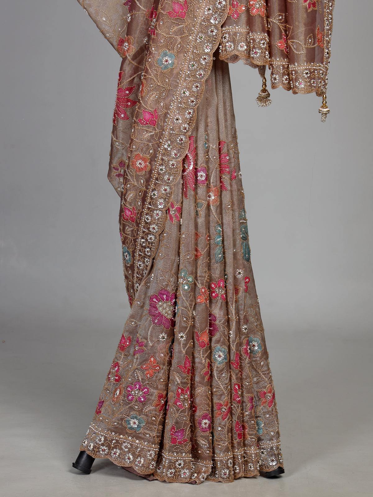 Coffee brown tissue silk saree with floral embroidery and tassels