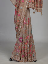 Coffee brown tissue silk saree with floral embroidery and tassels