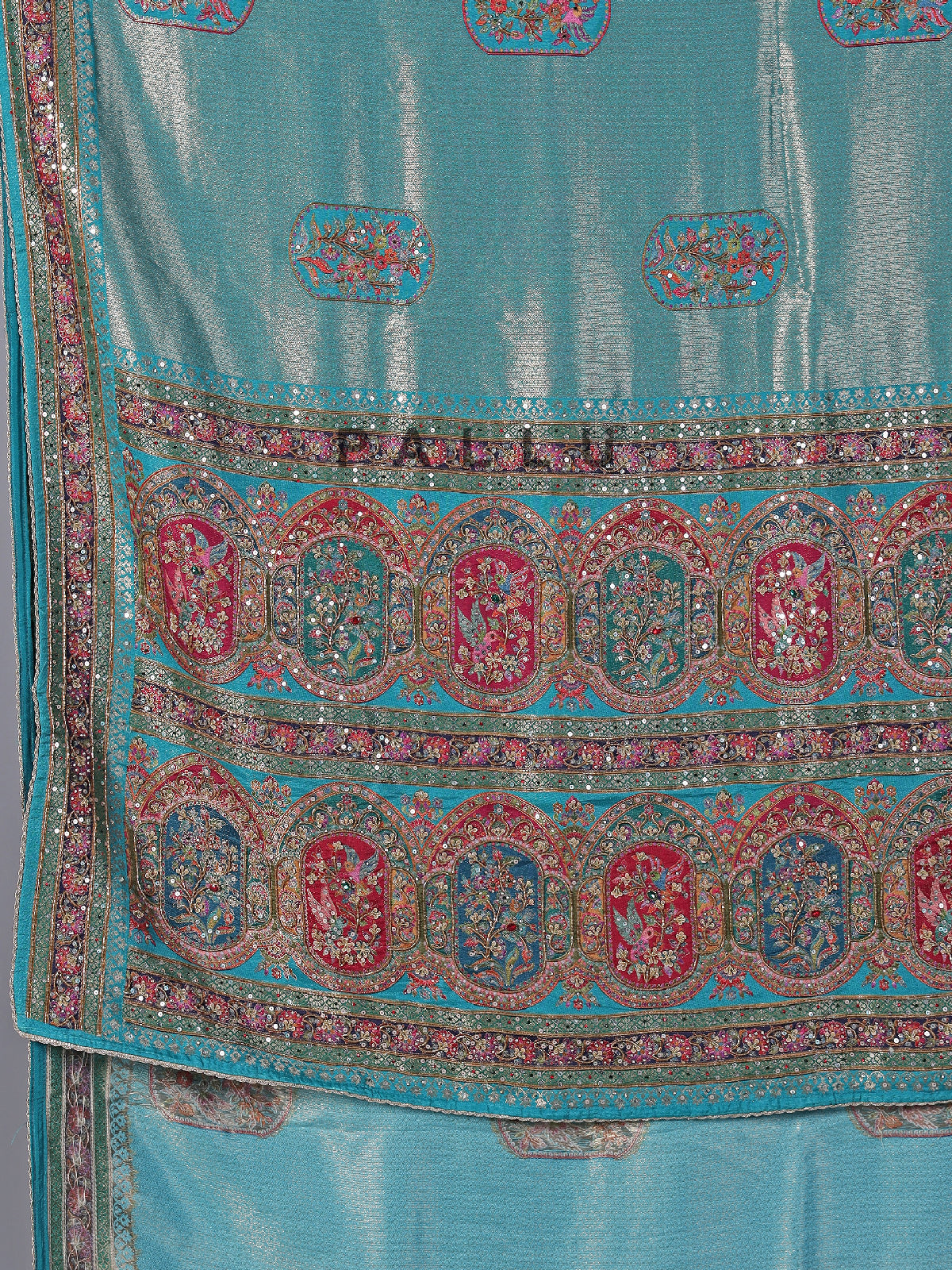 Aqua modal tissue silk saree with festive motifs