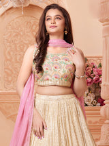 Beige silk lehenga choli with regal embellishments