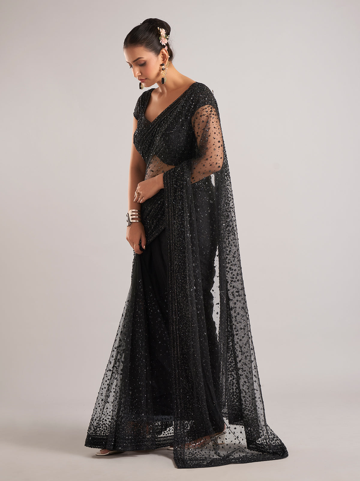 Black net saree with cutdana embellishments for women